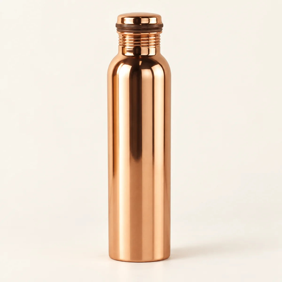 CPBTL01 smooth copper bottle with its rounded screw cap, front view